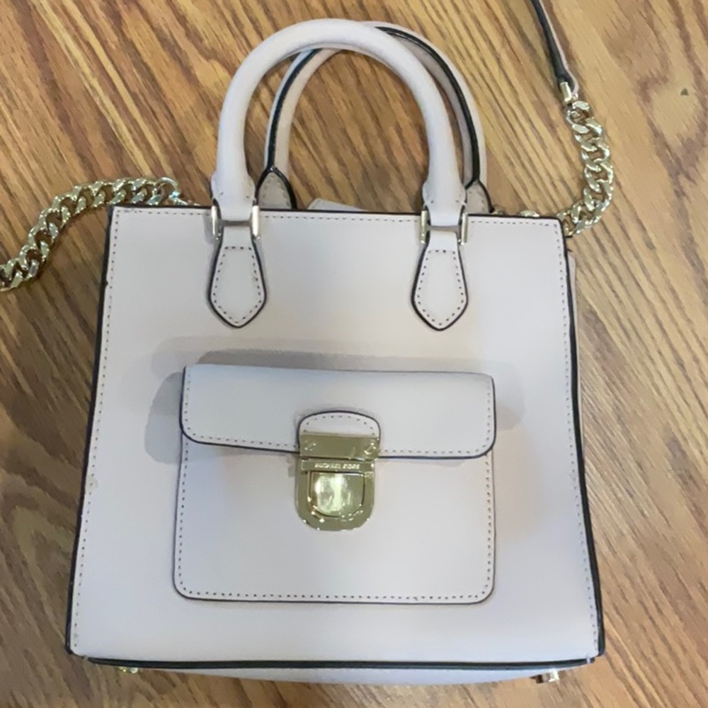 Michael Kors pale pink leather crossbody w/detachable strap.